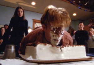 Dawson puts his face in the cake